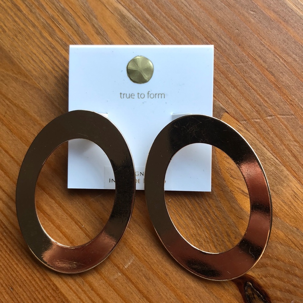 Gold thick oval earrings